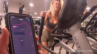 porn sexy girl working out with remote control sex toy in public gym porn