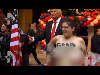 porn голая девушка с пятым размером груди набросилась на фигуру трампа в мадриде porn