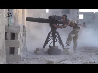 porn сирия боевики харакат хазм производят выстрел из птрк bgm 71 tow по буксируемой 130 мм пушке м 46 саа на холме porn